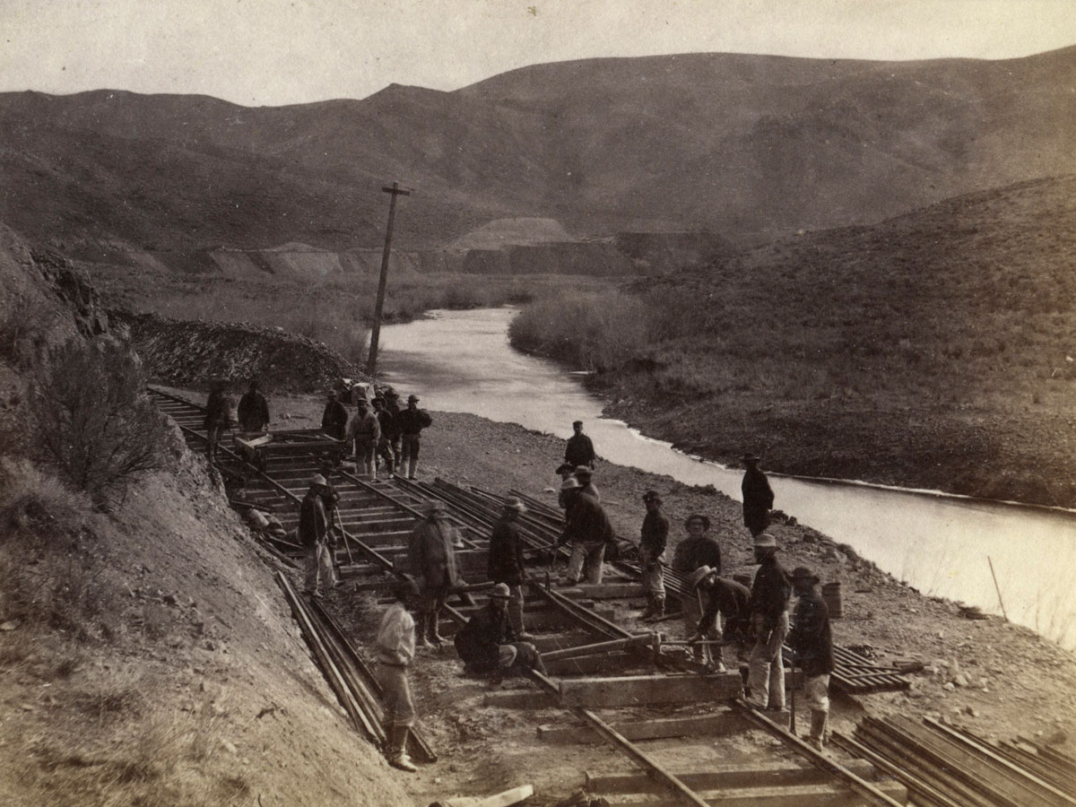 Chinese workers help lay tracks along the Ten Mile Canyon stretch of the transcontinental railroad route.